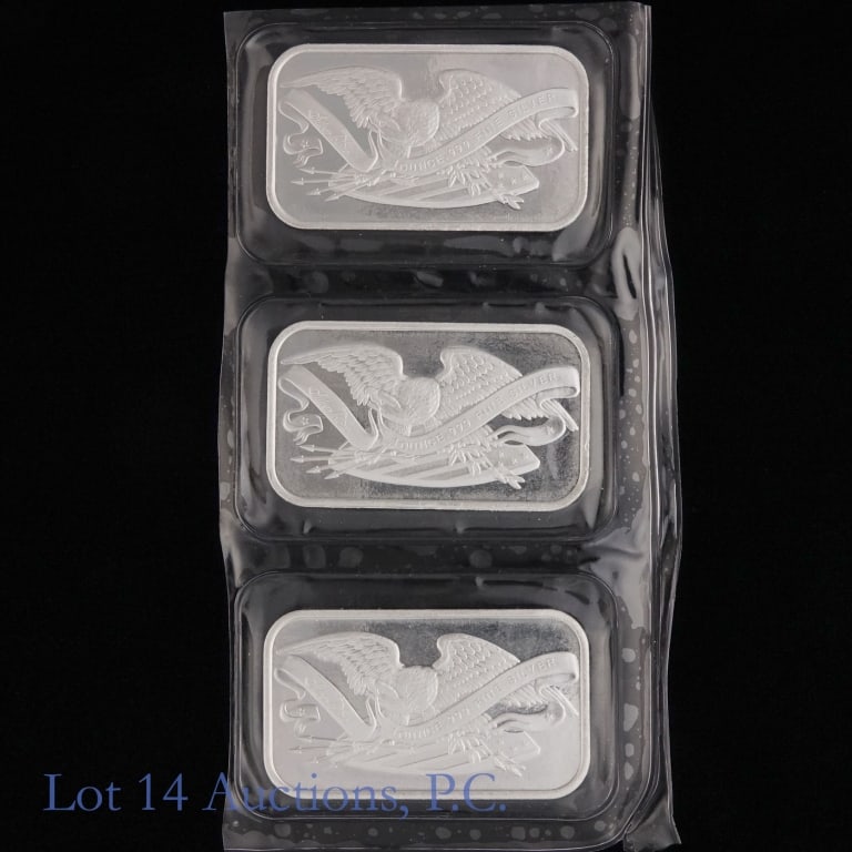 SilverTowne 99.9% Silver 1 Ozt. Ingots (3): Three (3) United States Silver Towne 99.9% silver one troy ounce ingots. Silver content confirmed on Lot 14 Auctions electronic metal verifier. *** Lot 14 Auctions is not a professional numismatic gra