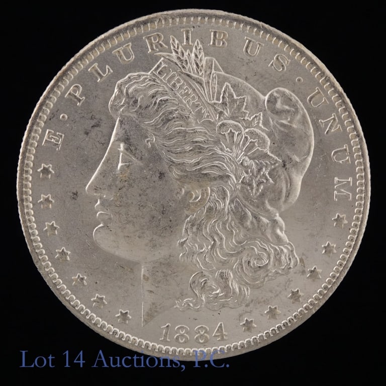 1884-O US Silver Morgan Dollar (*BU): 1884-O United States silver Morgan dollar (New Orleans Mint). *Per consigner, in BU condition with good luster. Metal is 90% silver with ASW 0.7734 troy ounces. Mintage 9,730,000. *** Lot 14 Auctions 