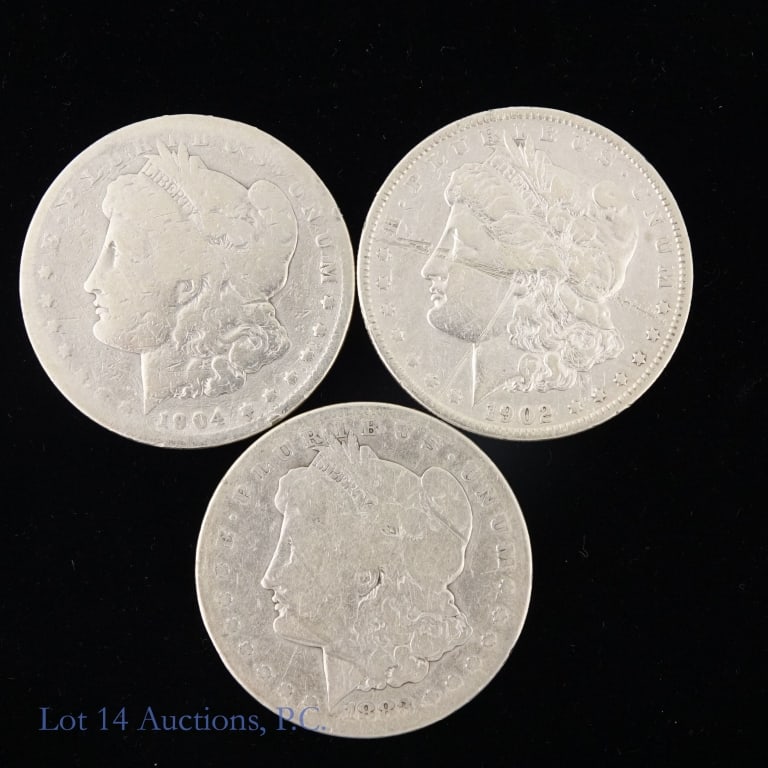 1883s, '02 & '04 Silver Morgan $1 ASW 2.2 Oz, 3: Three (3) United States 90%-silver Morgan dollars (Philadelphia, San Francisco Mints) as follows: ---1883-s, ---1902 (scratches on obverse, and ---1904. Silver content confirmed on Lot 14 Auctions ele