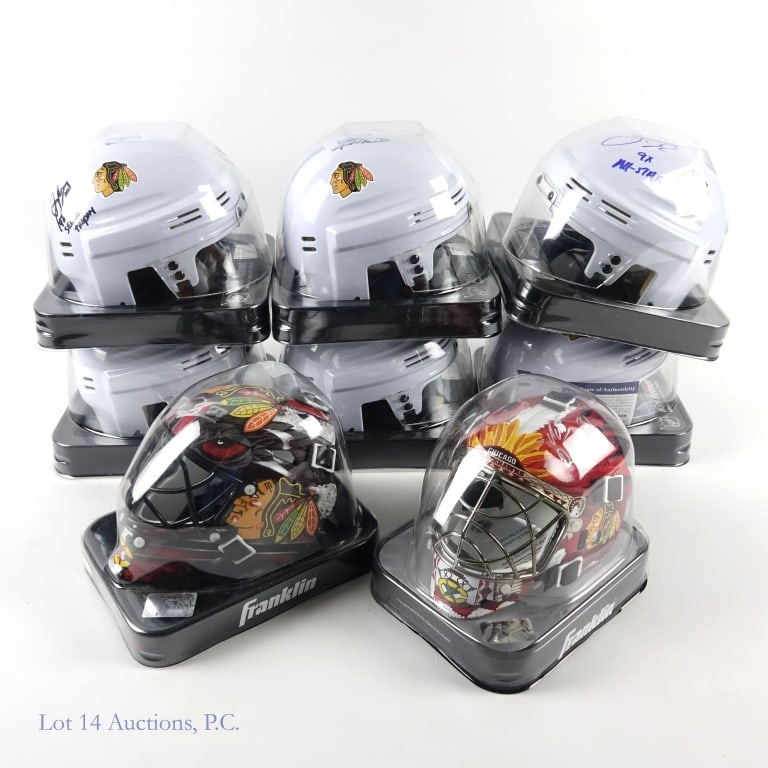 Chicago Blackhawks Signed Mini Helmets (8): *** This lot is sold "as is" with no COA or guarantee, except where specifically noted. *** Eight (8) autographed Chicago Blackhawks mini helmets: SportStar white Chicago Blackhawks mini ice hockey