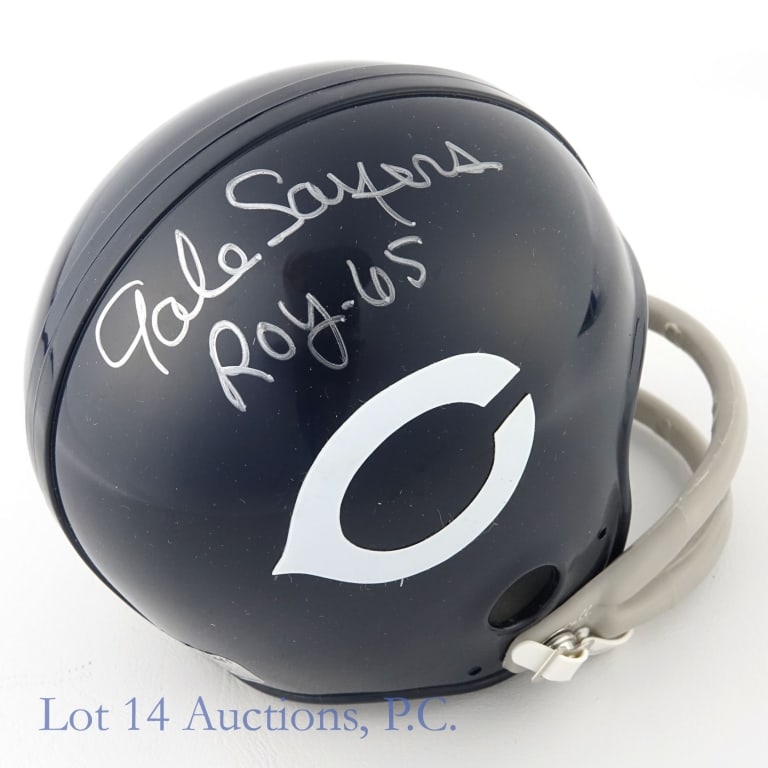 Gale Sayers Signed Chicago Bears Mini Helmet: Chicago Bears mini-helmet (1960s throwback white wishbone "C" logo). Signed on right side above the logo by Gale Sayers (inscribed "ROY - 65"). Comes with autograph ticket for 2011 signing at The