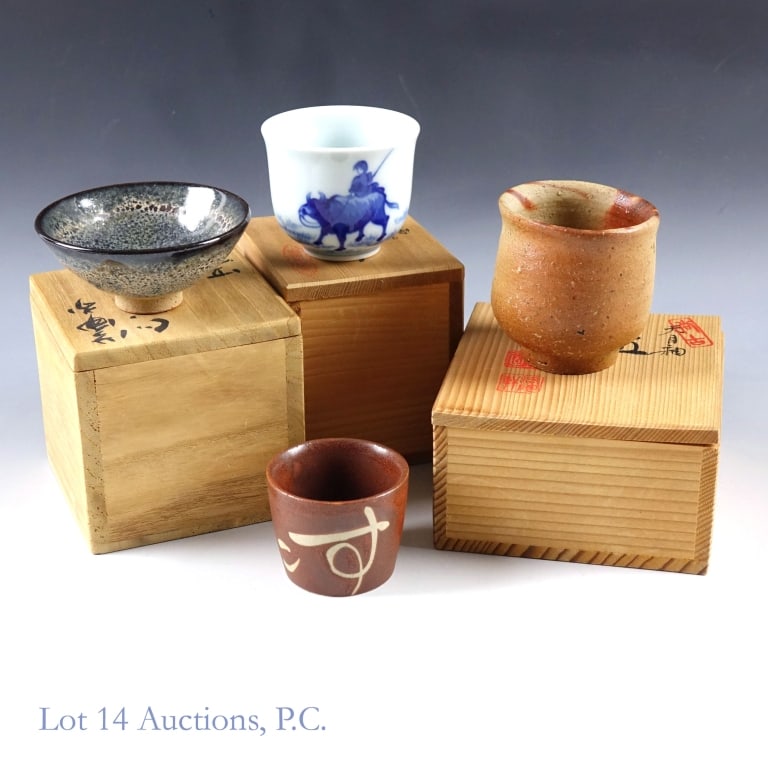 Various E. Asian Tea Cups (Jianzhan Cup & More): Four tea cups/bowls from China or Japan. The first is a very small Jianzhan style cup with the popular "oil drop" glaze style. It has a diameter of approximately 3" and a height of approximately