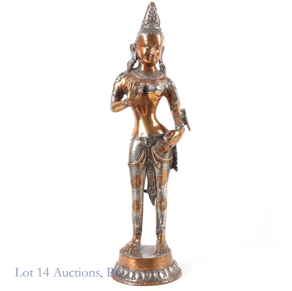 Tibetan Buddhist Deity Tara Two Tone Metal Statue: Copper and silver colored two tone metal sculpture of Tibetan Buddhist Deity Tara. Approximately 17" tall.