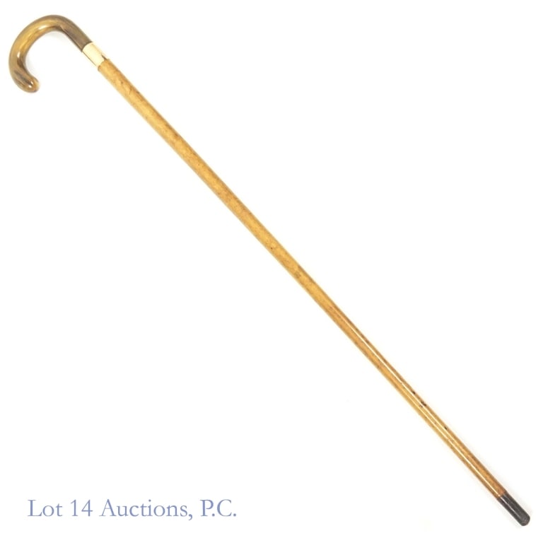English Presentation Cane (12k Gold Horn): English presentation cane with wood body, horn handle, and gold ferrule. Hallmarks on the ferrule indicate Birmingham, England (anchor), 12 karat gold ("12" and ".5") and a date of 1882 (small h in