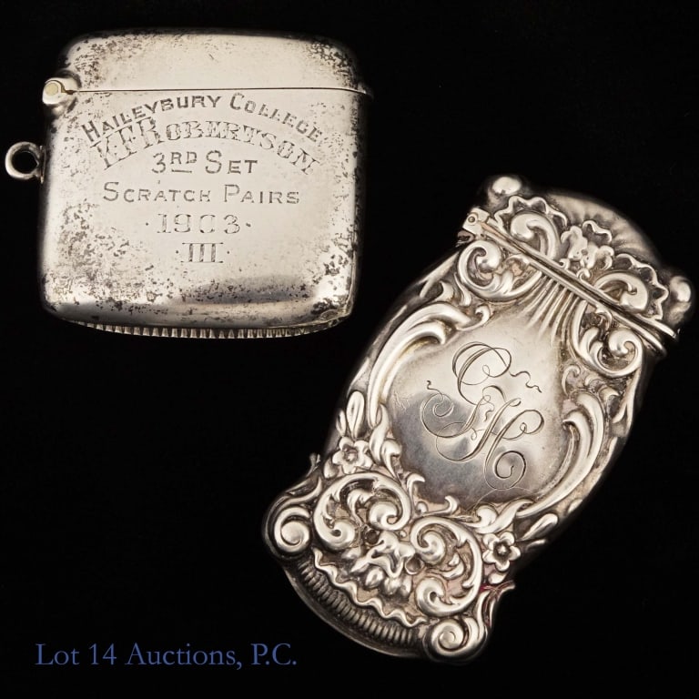 Antique Sterling Silver Vesta Cases / Match Safes: Two antique vesta cases made from sterling silver from the late 19th or early 20th centuries. One is more elaborately decorated, monogrammed with the initials "GH" on one side and the date "1896" on