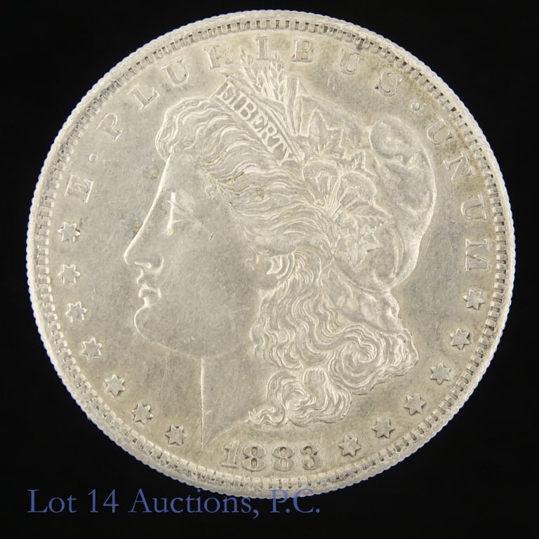 1883-S US Silver Morgan Dollar: 1883-S United States silver Morgan dollar (San Francisco Mint). Metal is 90% silver (ASW 1.5 ozt.). Mintage 6,250,000. Silver content confirmed on Lot 14 Auctions electronic metal verifier. Per