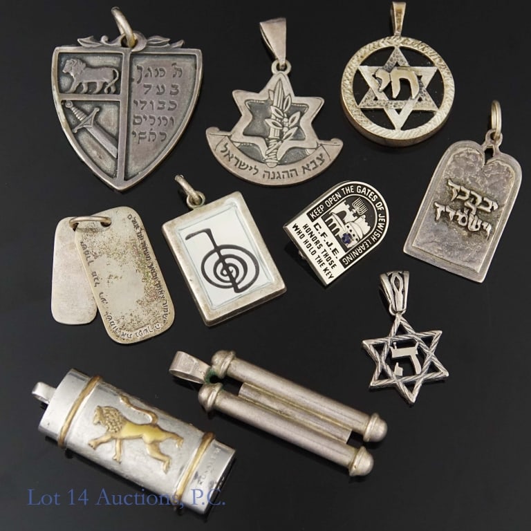 Sterling Silver Pendants Lot: Lot of 10 sterling silver pendants. Total weight is approximately 48.64g or 1.56 troy oz.