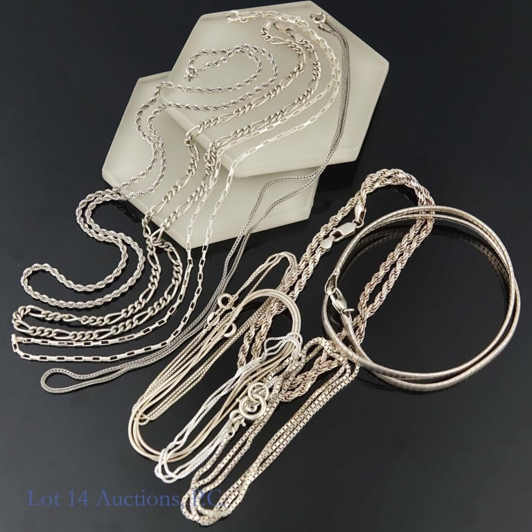 Sterling Silver Chains (10): Lot of 10 sterling silver chains. Total weight is approximately 73.41g or 2.36 troy oz.