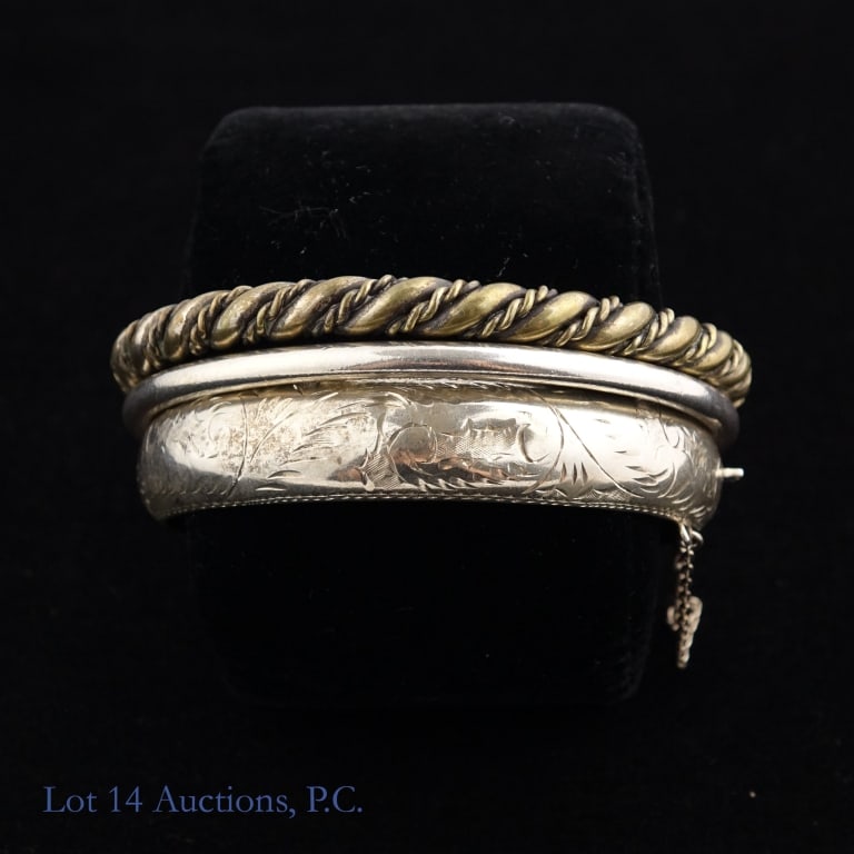 Sterling Silver Bangles (3): Three bangle bracelets made with sterling silver, each marked 925. The total weight of all three bangles is approximately 76.41g or 2.45 troy oz.