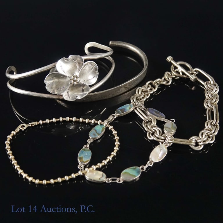 Sterling Silver Bracelets (5): Five bracelets made with sterling silver. Total weight of lot is approximately 62.75g or 2 troy oz. See photos for details
