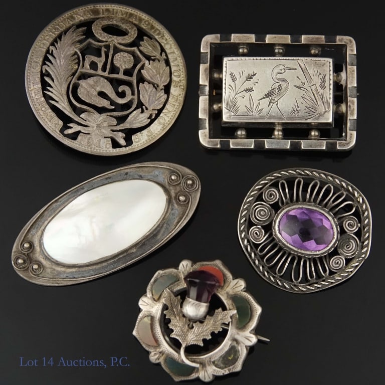 Various Vintage Silver Pins: 5 silver pins, two of which are broken and missing the pin back. One is marked as sterling silver. The rest are unmarked, but they all passed an acid test for silver content. Total weight of lot