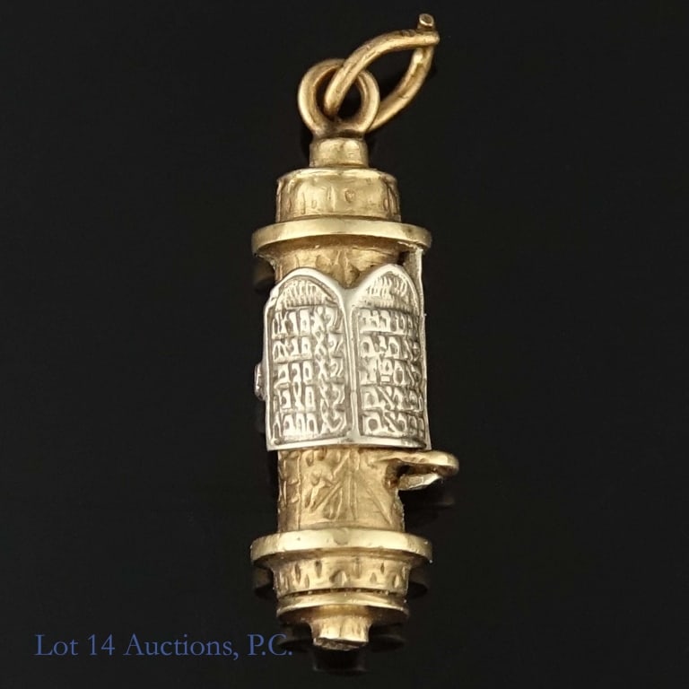 10k Yellow Gold Mezuzah Pendant: A small pendant shaped like a mezuzah marked 10k on the underside. Weighs approximately 2.62g or 0.08 troy oz.