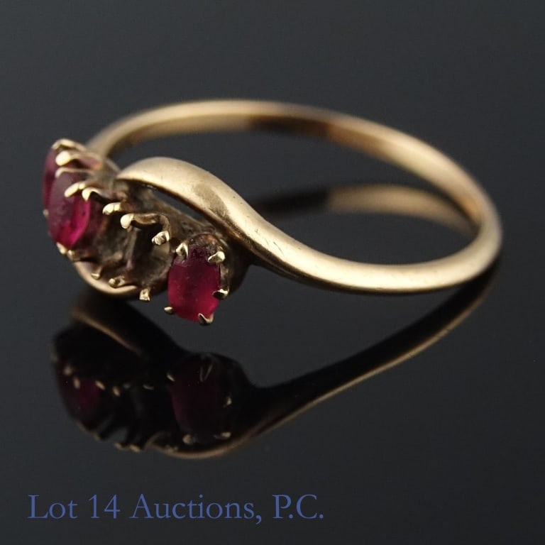 10k(?) Yellow Gold Ring: Size 6.5 ring, electronically tested as 10k yellow gold. Has three red stones out of five remaining (Two are missing). Inscription reading "N" on the inside. See photos for details. Weighs