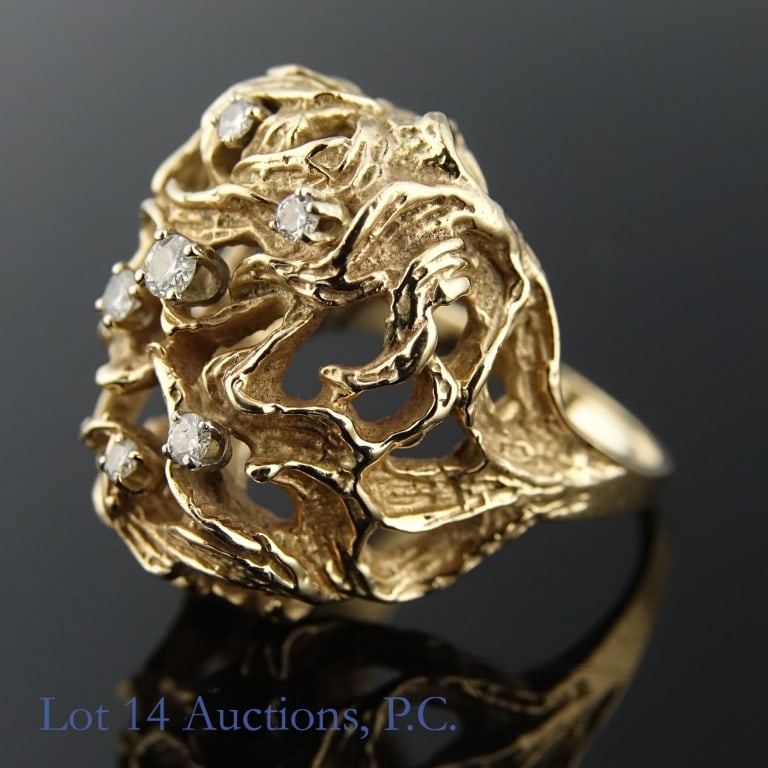 14K Yellow Gold And Diamond Art Ring: 14K yellow gold and diamond art ring. Size approximately 7.5. Weight approximately 15.3 g - 0.49 ozt.