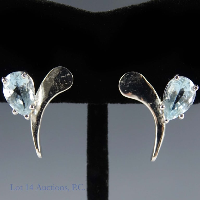 14k White Gold Earrings w/ Aquamarine: Pair of earrings made from 14k white gold, each with an aquamarine stone. Weighs approximately 3.28g or 0.11 troy oz total.