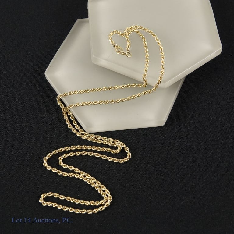 14k Yellow Gold Rope Chain: 25" long rope style chain made with 14k yellow gold. Weighs approximately 11.08g or 0.35 troy oz.