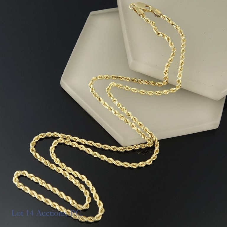 14k Yellow Gold Rope Chain: 21.5" long rope style chain made from 14k yellow gold. Weighs approximately 10.59g or 0.34 troy oz.