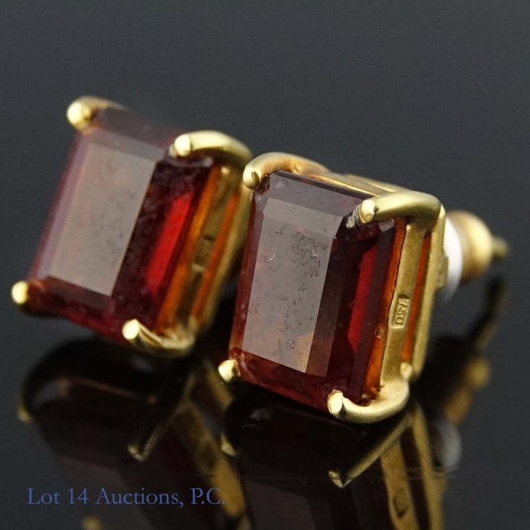 18k Yellow Gold Earrings: Pair of earrings made from 18k yellow gold, each marked "750". Gold holds a rectangular cut brown stone, possibly citrine, hessonite, or some kind of quartz. Weighs approximately 2.6g or 0.08 troy oz.