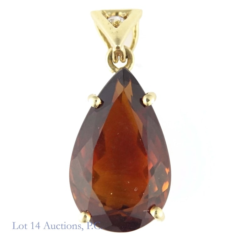 18k Yellow Gold Pendant: 18k yellow gold pendant with a brown stone, possibly citrine, hessonite, or some kind of quartz. Weighs approximately 2.69g or 0.08 troy oz.