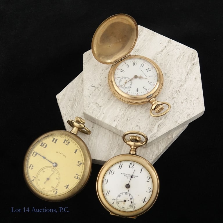 Illinois, Knickerbocker & A Michaal Pocket Watches: Three rose gold tone pocket watches - Illinois, 44.5mm case diameter. Watch is running but has not been tested for accuracy or power reserve *** Knickerbocker, 38mm case diameter. Watch is not