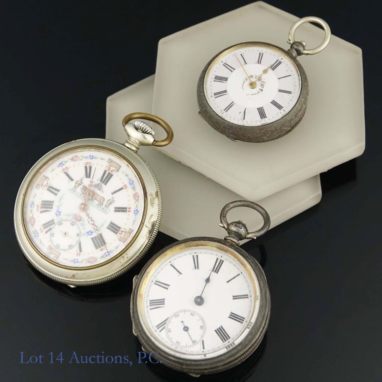 3 Pocket Watches, 1 Running, 2 Silver Cases: Four(4) pocket watches. Three key wind watches for parts / repair. One (mechanical crown-wind) is running, but not serviced or inspected. 1 - The running watch is an open-face Swiss watch with cows / 
