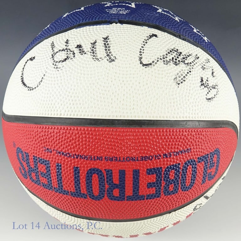 Harlem Globetrotters Basketball Signed By 4: Full size Harlem Globetrotters basketball signed by four players we are unable to identify. All four signatures were penned with a black marker. The signatures do not have a third party COA and are