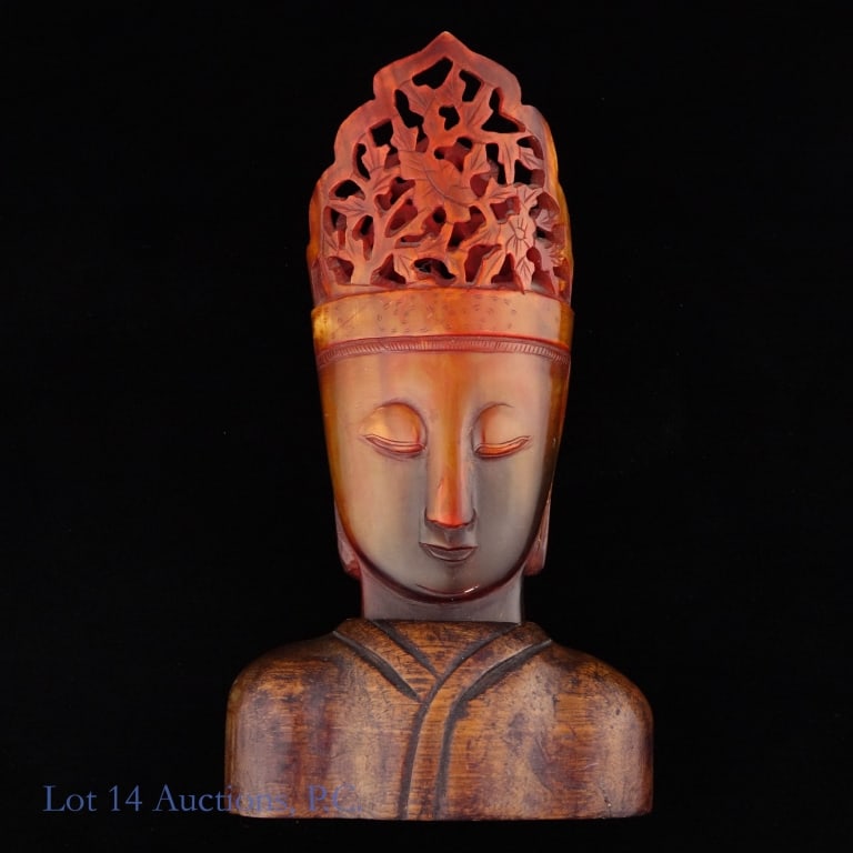 Chinese Carved Horn Guanyin Bust: Tabletop sized bust of Guanyin, the Bodhisattva of Compassion and Mercy in East Asian Buddhism. The bust's head is carved from horn, likely a domestic buffalo horn, mounted on a hardwood base making