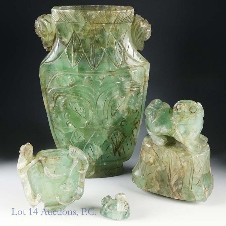 Two Antique Chinese Hardstone Urns: Two antique Chinese urns carved from hardstone, lids included. Both pieces have some signs of age and wear, and one of the animals on the side of the small urn is missing a paw, but overall both are