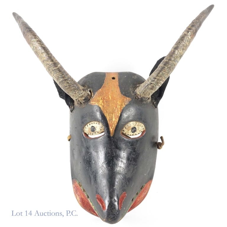 Devil / Goat Mask Goat Horn (Mexico Early 20th c): Hand carved wooden mask depicting a goat or devil. Horns are made from real goat horn. Per consigner - Mexico, early 20th century. Approximately 12.75" horn tip - to - horn tip. Face (without horns)