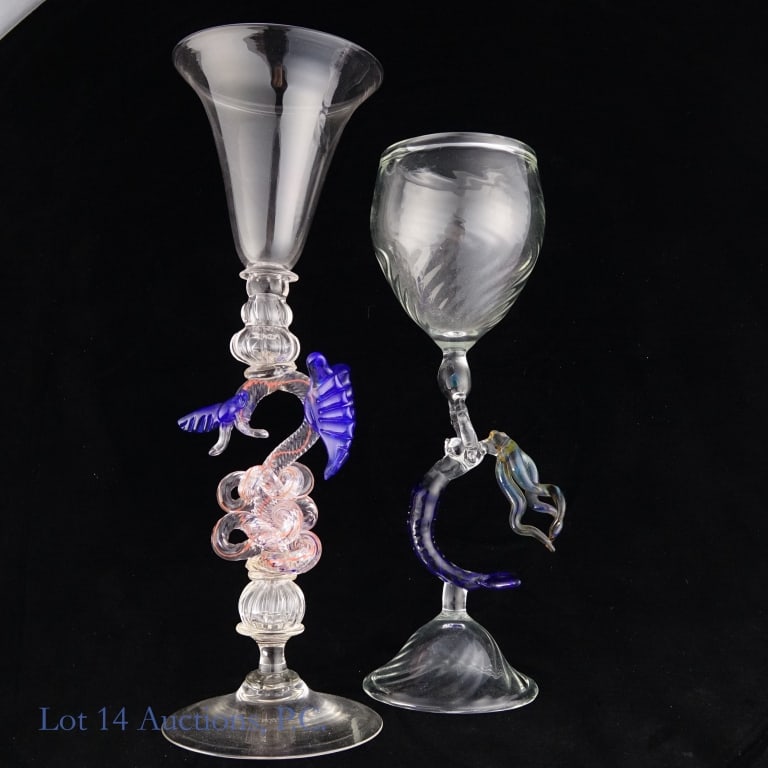 William Gudenrath & Unsigned Venetian Art Glass: LOCAL PICKUP OR THIRD PARTY SHIPPING ONLY. Two art glass goblets. The larger of the two is decorated with a dragon with a very long tail. The end of the tail cuts off abruptly; it is unclear if the