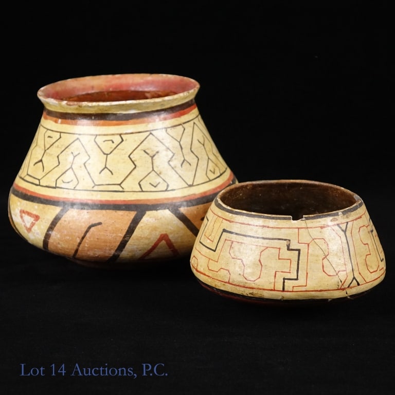 Two Peruvian Shipibo-Conibo Polychrome Vessels: Two handmade polychrome vessels from Peru made by Shipibo-Conibo artists. Both are in fairly good condition for their age other than some scratches and wear. The smaller vessel also has two 1cm wide