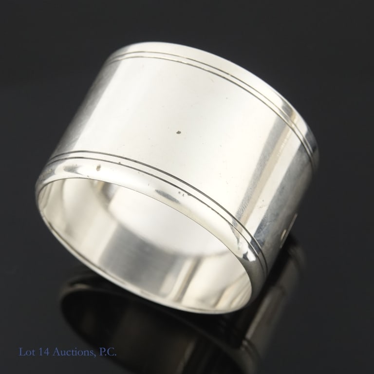 Tiffany & Co Makers Sterling Silver Napkin Ring: Vintage Sterling silver napkin ring made BY the Tiffany & Co silversmiths (not by a third party for Tiffany). Some scuffs and tarnish. Monogrammed "JTF". No dings, dents or misshapen portions.
