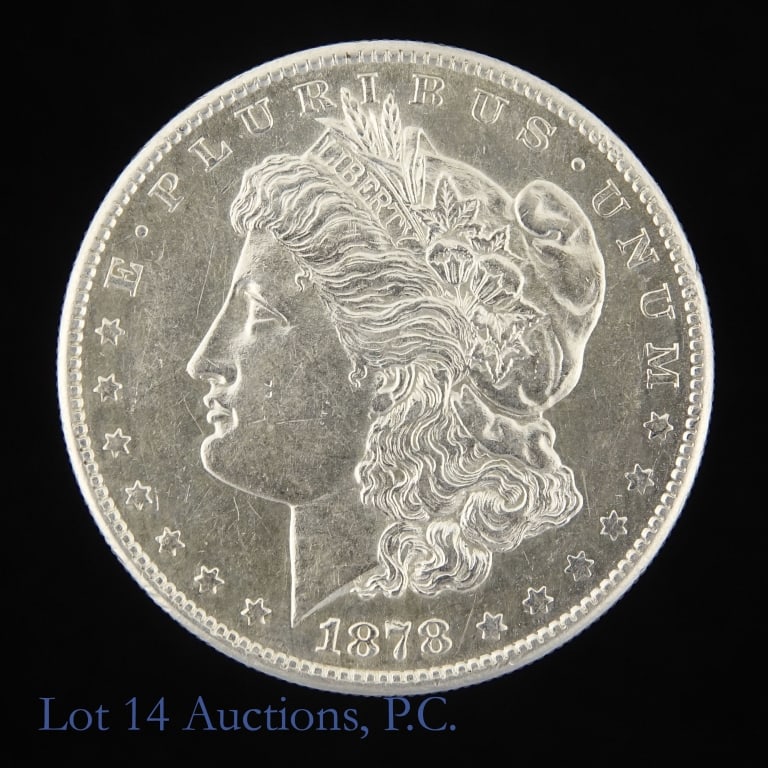 1878-S US Silver Morgan Dollar: 1878-S United States silver Morgan dollar (San Francisco Mint). Metal is 90% silver (ASW 1.5 ozt.). Mintage 9,774,000. Silver content confirmed on Lot 14 Auctions electronic metal verifier. Greysheet