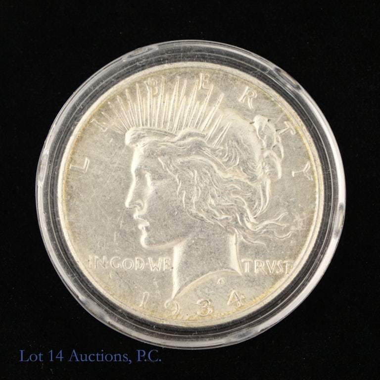 1934-S US Silver Peace Dollar (Key Date!): 1934-S United States silver peace dollar (San Francisco Mint). Per consigner, in AU condition. Metal is 90%-silver (ASW 0.7734 ozt.). Mintage 1,011,000 with a PCGS survival estimate of 35,000 (R-2.6).