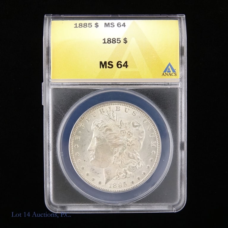 1885 US Silver Morgan Dollar (ANACS MS64): 1885 (P) United States silver Morgan dollar (Philadelphia Mint). ANACS graded MS 64). Metal is 90% silver. ***Lot 14 Auctions is not a professional numismatic grading agency. Consigner descriptions ar