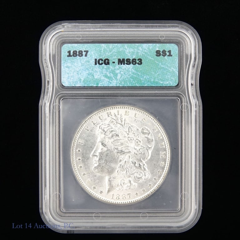 1887 (P) Silver Morgan Dollar (ICG MS63): 1887 (P) United States silver Morgan dollar (Philadelphia Mint). ICG graded MS63. Metal is 90% silver. ***Lot 14 Auctions is not a professional numismatic grading agency. Consigner descriptions are pr