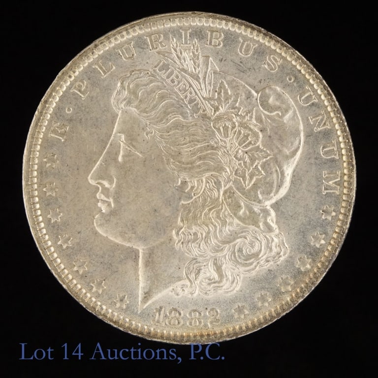 1882-O US Silver Morgan $1 (*Clean Cheek): 1882-O United States silver Morgan dollar (New Orleans Mint). *Per consigner, better date with some original luster, clean cheek and bag marks/scratches on reverse. Metal is 90%-silver (ASW 0.7734 ozt