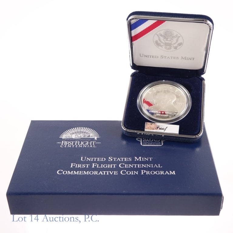 2003-P US Silver Proof First Flight 100th Ann $1: 2003-P United States silver proof DCAM first flight centennial commemorative dollar (Philadelphia Mint) in OGP with COA. Metal is 90% silver (ASW 0.7734 ozt.). Mintage 190,240. *** Lot 14 Auctions is 