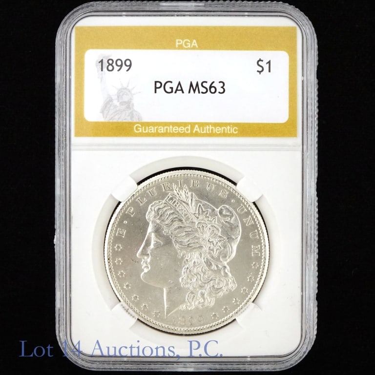 1899 (P) US Silver Morgan Dollar (Tough To Find): 1899 (P) United States silver Morgan dollar (Philadelphia Mint). PGA slabbed "MS63". Mintage is 330,000 with a PCGS survival estimate of 20,00 (R-2.8) in grades 60 or better. Per Greysheet, "just toug