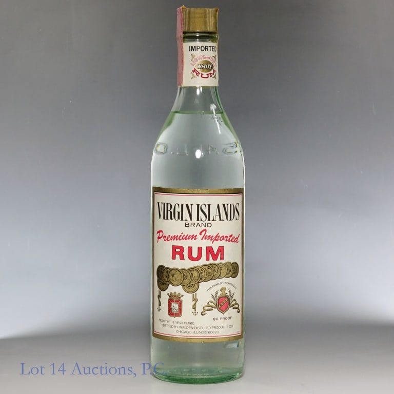"79" Virgin Islands Brand White Rum: Virgin Islands Brand White Rum. 80 Proof, 750ml. "79" glass mold. 70s/80s tax strip fully intact.