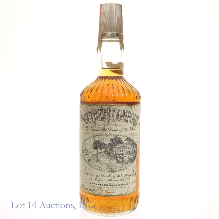 1972* Southern Comfort Liqueur: Southern Comfort Liqueur with Series 112 tax strip and "72" bottle moulding*. Labels in poor condition, strip sealed. 4/5 quart and (appears to be) 100 proof.