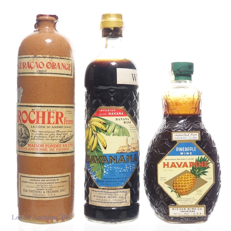 40s/50s Curacao Orange, Banana & Pineapple Wine, 3: 1940s/1950s Rocher Freres Curacao Orange Liqueur. 80 Proof, 4/5 Quart. Tax strip damaged *** Havanana Banana Wine. 20.5% ABV, 4/5 Quart. Low shoulder fill *** Havapine Pineapple Wine. 20.5% ABV, 4/5