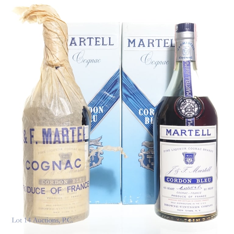Vtg Martell Cordon Bleu Grand Classic Cognac (2): Two bottles Martell Cordon Bleu Cognac in their original boxes. Each one is 80 Proof, 750 ml. Series 112 tax strips intact. See photos for details.