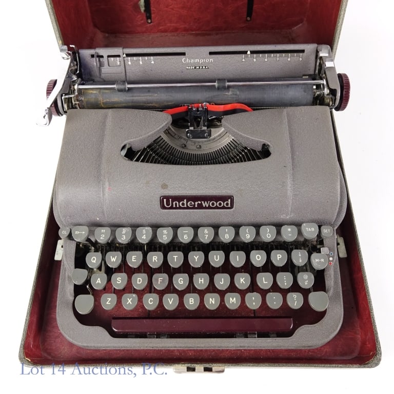 Underwood Finger-Flite Champion Typewriter: Mid Century Underwood Finger-Flite Champion typewriter in original case. Two-tone gray finish with maroon accents.
