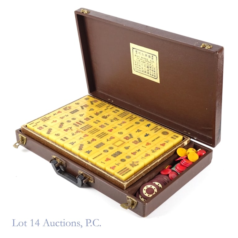 Mid Century Kue Hing Imported Bakelite Mahjong Set: Mid century Chinese Bakelite Mahjong set by Kue Hing Co. New York. Set Includes 144 Chinese Bakelite tiles, betting chips and dice housed in a wooden carrying case. Case measures approximately 14.5"
