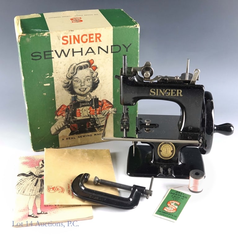 Singer Sewhandy Mod 20 Child's Sewing Machine CIB: Singer Sewhandy Model 20 child's sewing machine. Complete in original box with the accessories. Very good condition.