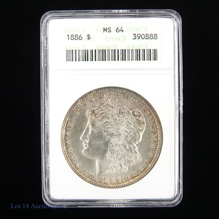1886 (P) US Silver Morgan Dollar (ANACS MS64): 1886 (P) United States silver Morgan dollar (Philadelphia Mint). Metal is 90% silver. Early ANACS holder graded MS64. Greysheet wholesale price guide value at CAC MS-64 is $120. ***Lot 14 Auctions is 