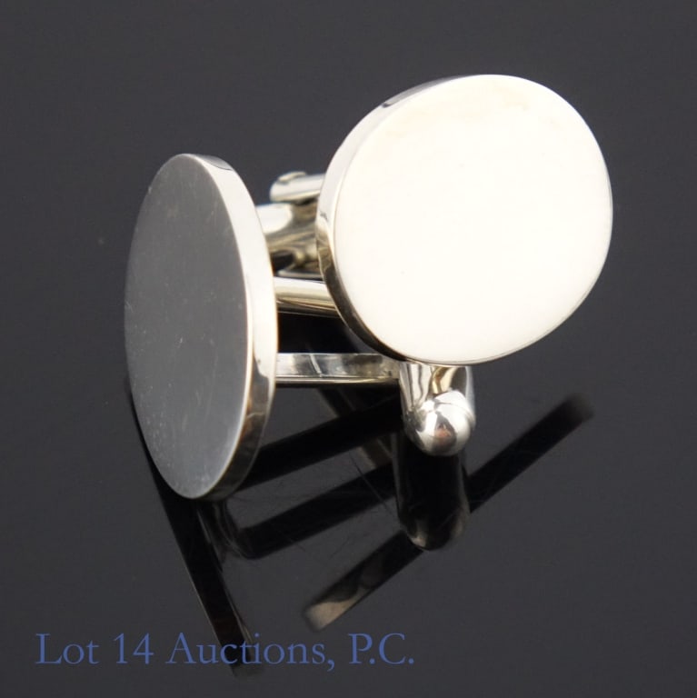 Tiffany & Co Unmonogrammed Sterling Cufflinks: Set of sterling silver oval cufflinks by Tiffany & Co. The monogram has been polished off by a professional jeweler, leaving them blank. See photos for details. Total weight of lot is approximately 15