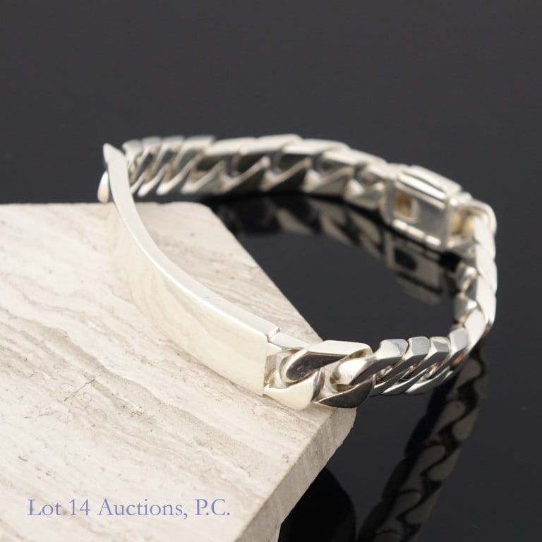 Tiffany & Co Sterling Silver ID Bracelet: Vintage sterling silver ID chain bracelet by Tiffany & Co. The text has been polished off by a professional jeweler, leaving the ID section of the bracelet blank. See photos for details. Total weight