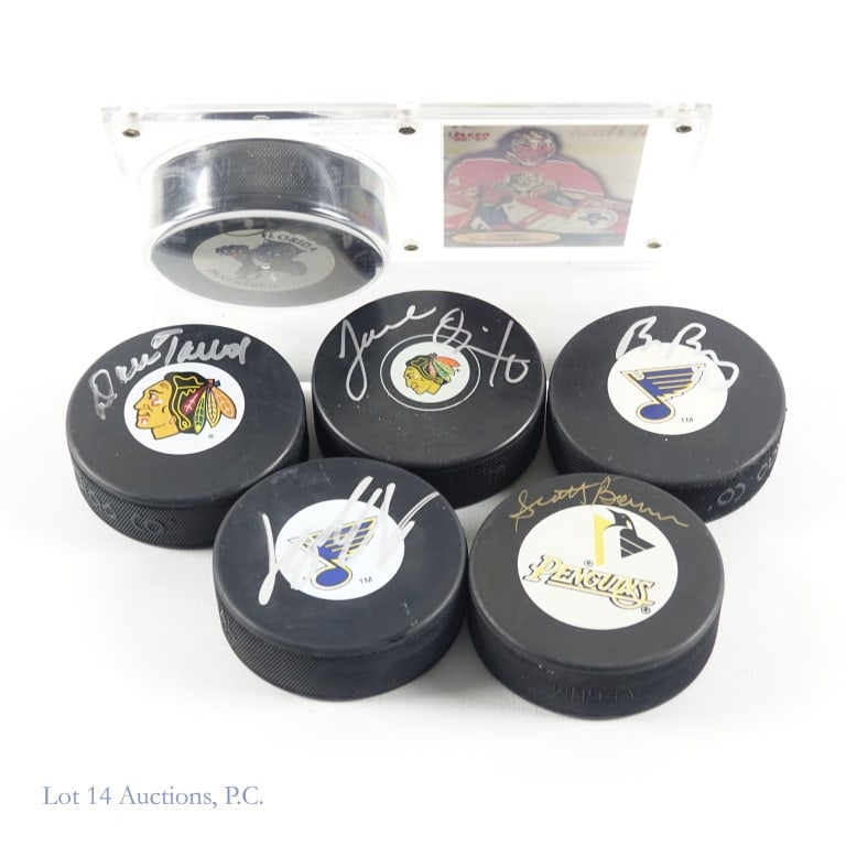 Signed Hockey Pucks (6): Assortment of six hockey pucks signed by former NHL players. Players in this collection include John Vanbiesbrouck *** Joel Quenneville *** Scotty Bowman *** Yan Stastny *** Brad Boyes *** Dale